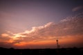 Blue sky with white clouds on sunset. Many little white clouds creating a tranquil weather pattern on the blue background