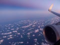 Blue sky and white clouds view from porthole airplane Royalty Free Stock Photo