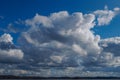 Blue sky white cumulus clouds warm spring day Royalty Free Stock Photo