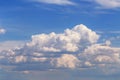 Blue sky with white cumulus fluffy clouds background texture Royalty Free Stock Photo