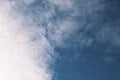 blue sky with white fluffy clouds, beautiful dark heaven, light and soft cumulus in deep skies outdoors Royalty Free Stock Photo