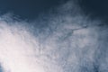 Blue sky with white fluffy clouds, beautiful dark heaven, light and soft cumulus in deep skies outdoors Royalty Free Stock Photo