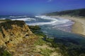 Blue sky, white ocean waves and sunshine sandy beach at Pacific Coast