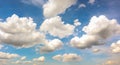 Blue sky with white plump fluffy clouds and sun. Cumulus clouds. Nature weather blue sky. Beautiful background white clouds Royalty Free Stock Photo