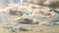 Blue sky with white plump fluffy clouds and sun. Cumulus clouds. Nature weather blue sky. Beautiful background white clouds Royalty Free Stock Photo