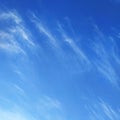 Blue sky with white small feather clouds Royalty Free Stock Photo