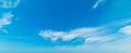 Small clouds in the blue sky in summertime Royalty Free Stock Photo