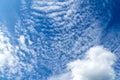 Blue sky with white, soft clouds. Natural white and blue background. Royalty Free Stock Photo