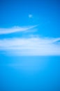 Blue sky & wispy cloud
