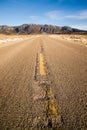 Blue Sky Worn Mountain Road Desert Travel Asphalt Royalty Free Stock Photo