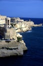 Blue skyline and Siege Bell War Memorial in a harbor Valletta Royalty Free Stock Photo