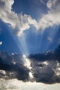 Blue skys and dramatic sunbeams Royalty Free Stock Photo