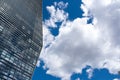 Blue skyscraper with reflections of clouds on windows Royalty Free Stock Photo