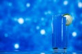 Blue slush ice in glass on glitter star Royalty Free Stock Photo