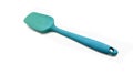 a blue small silicone spatula isolated on white background. versatile kitchen utensils Royalty Free Stock Photo