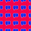 Blue Smile face icon isolated seamless pattern on red background. Smiling emoticon. Happy smiley chat symbol. Vector Royalty Free Stock Photo