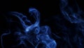 Blue smoke on black background