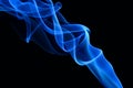 Blue smoke on the black background. Royalty Free Stock Photo