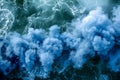 blue smoke over water creating a wave effect Royalty Free Stock Photo