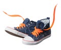 Blue sneaker with orange laces isolated