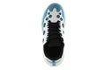 Blue sneakers with black inserts Royalty Free Stock Photo