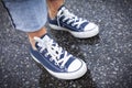 Blue Sneakers in the Rain Royalty Free Stock Photo