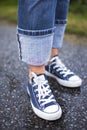 Blue Sneakers in the Rain Royalty Free Stock Photo