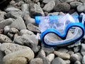 Blue Snorkling mask rocks