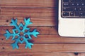 Blue snowflake on wooden board special edition for winter season Royalty Free Stock Photo