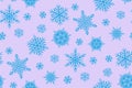 Blue snowflakes on pink background Royalty Free Stock Photo