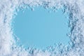 Blue snowy christmas background. Snow frame, space for text. Christmas greeting card Royalty Free Stock Photo