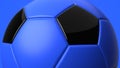 Blue soccer ball on blue background.