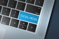 Blue Social Media Call to Action button on a black and silver keyboard Royalty Free Stock Photo