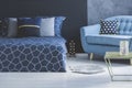 Blue sofa in cozy bedroom Royalty Free Stock Photo