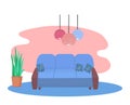 Blue sofa with patterned cushions, indoor potted plant, colorful hanging lamps, modern living room decor. Cozy interior