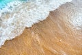 Blue soft waves roll on the Golden sand. Royalty Free Stock Photo
