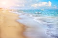 Blue soft waves roll on the Golden sand. Royalty Free Stock Photo