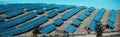 Blue solar panel background of photovoltaic modules for renewable energy. Copy space. Banner. Solar panels against blue sunny sky Royalty Free Stock Photo