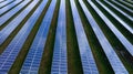 Blue Solar panel farm or solar power plantation. Alternative renewable energy with photovoltaic cell industry. Green energy Royalty Free Stock Photo