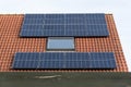 solar panels on a red tiled roof Royalty Free Stock Photo