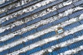 Blue solar photo voltaic panels system producing renewable clean energy in rural area in winter Royalty Free Stock Photo