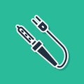 Blue Soldering iron icon isolated on green background. Vector