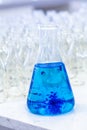 Blue solution methylene blue in erlenmeyer, experiments in chemistry laboratory