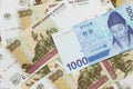 A Korean won bank note with Russian one hundred ruble bills