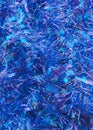 Blue shiny tinsel texture Close up photo