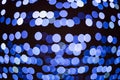 Blue Sparkling Lights Festive background with texture. Abstract Christmas twinkled bright bokeh defocused and Falling stars. Winte Royalty Free Stock Photo