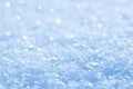 Blue sparkling snow background.