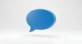 A blue speech bubble on a clean white background for communication Royalty Free Stock Photo