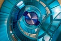 Blue spiral staircase from below