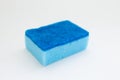 Blue sponges for cleaning and washing dishes on white background Royalty Free Stock Photo